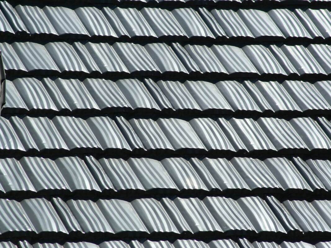 Residential metal roof shingles